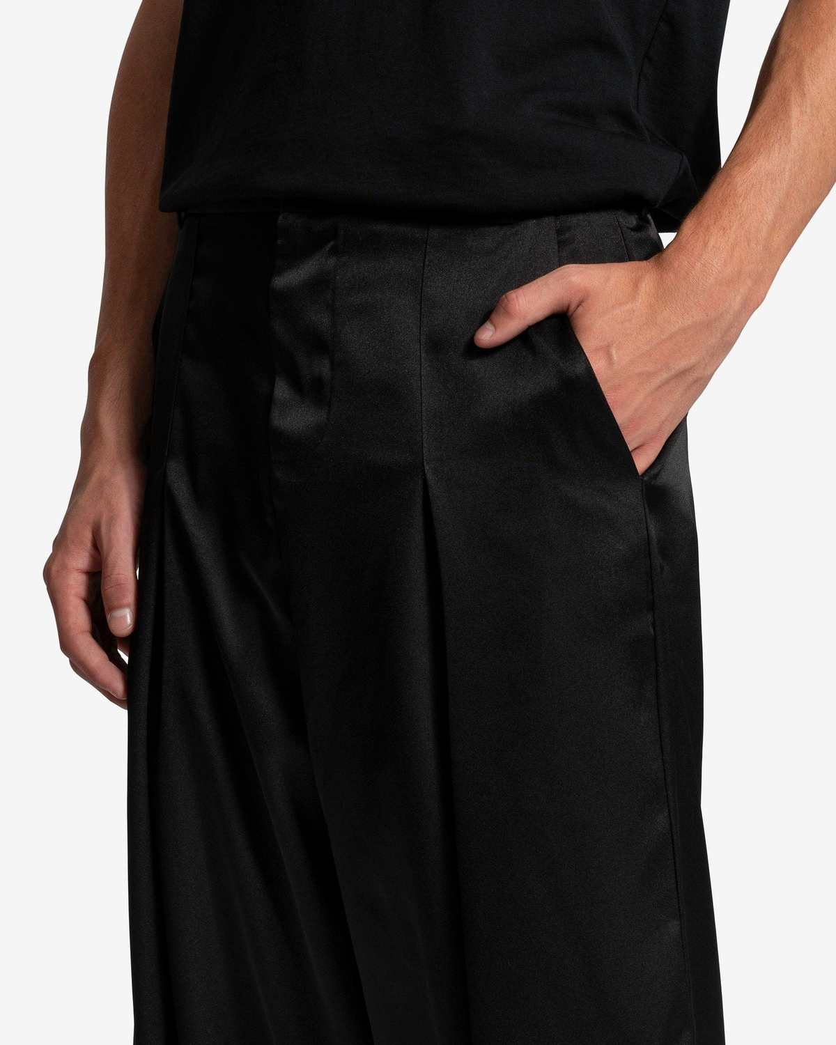 Edward Cuming Kickout Drape Trousers - Black | Garmentory