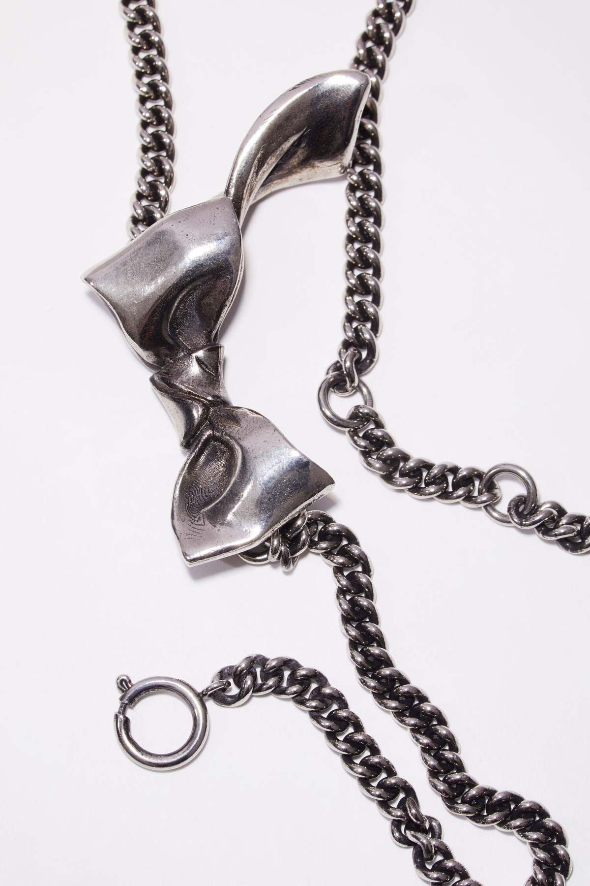Acne Studios Bow Necklace - Silver | Garmentory