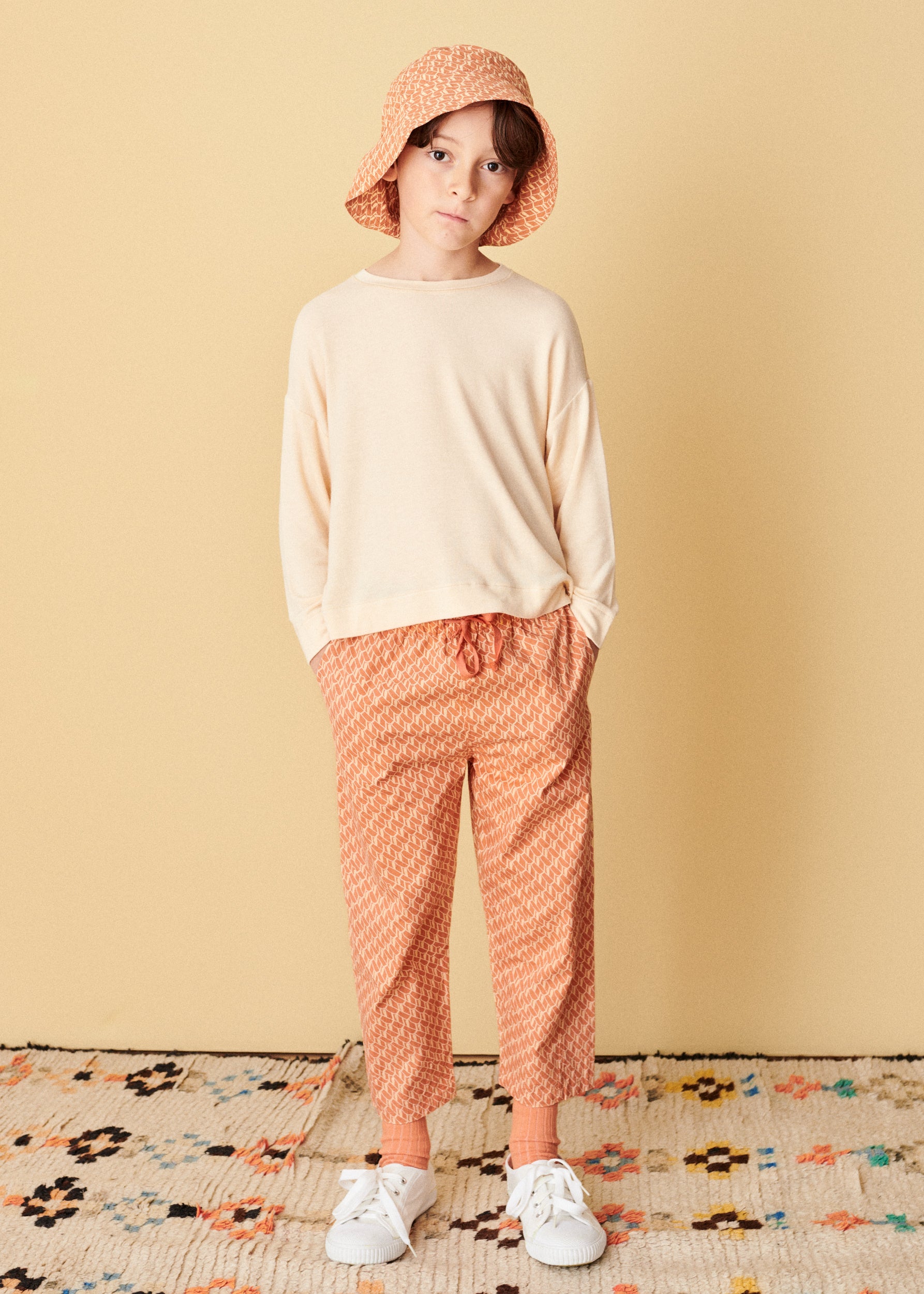 帽子 CARAMEL  CEDRUS HAT APRICOT GEO PRINT  M Kids Caramel CEDRUS HAT - APRICOT GEO PRINT | Garmentory