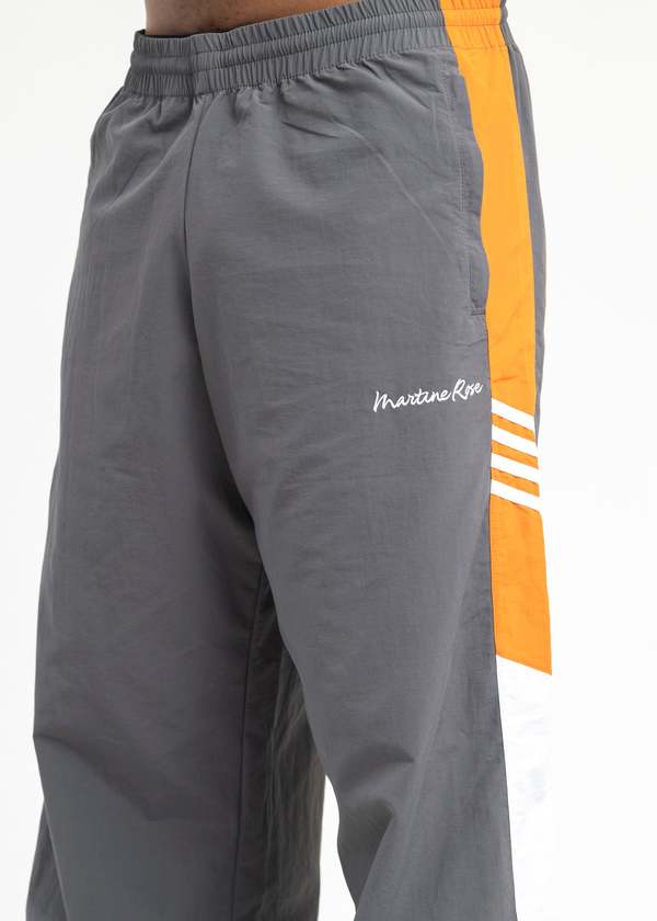 Martine Rose Men's' Wide Leg Track Pants in Black | LN-CC® | MARTINE ROSE 24AW WIDE LEG TRACK PANT | ジョガーパンツ・スウェットパンツ | Wqayen