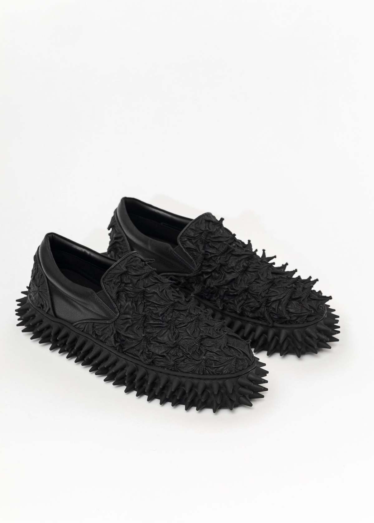 BLACK-PORCUPINE-SLIP-ON- 