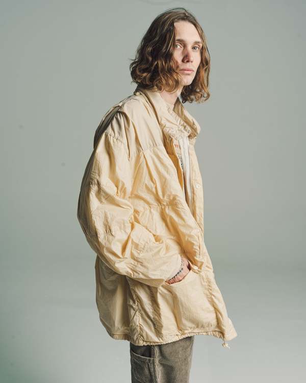 Our Legacy Rubberized Nylon Exhaust Puffa - Cream | Garmentory