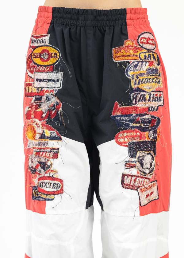 doublet ダブレット A.I. PATCHES TRACK PANTS Doublet A I PATCHES EMBRIDERY TRACK PANTS - BLACK/RED | Garmentory