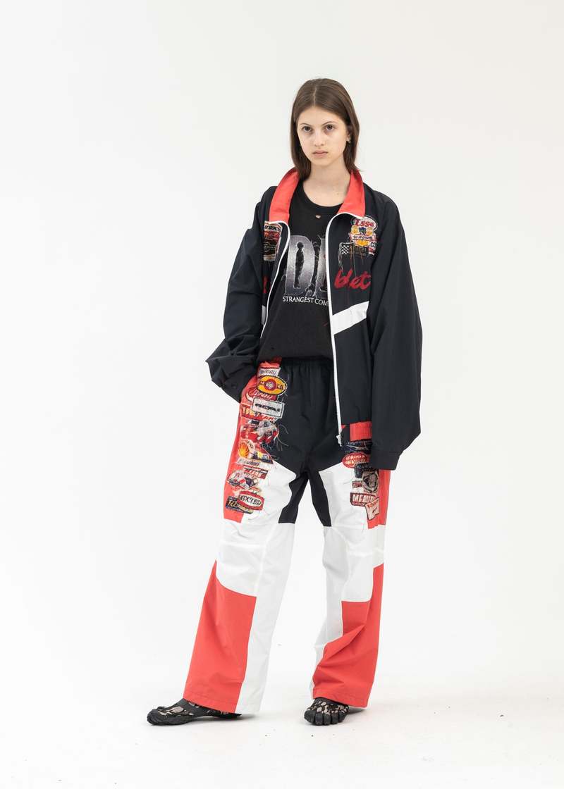 doublet ダブレット A.I. PATCHES TRACK PANTS Doublet A I PATCHES EMBRIDERY TRACK PANTS - BLACK/RED | Garmentory