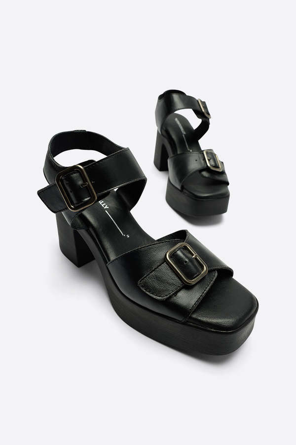 "INTENTIONALLY __________." MARGO SOLE PLATFORM HEEL - BLACK "INTENTIONALLY __________." MARGO SOLE PLATFORM HEEL - BLACK