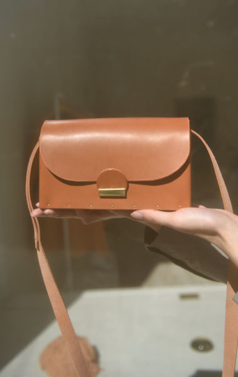Eatable of Many Orders Nose Clutch Bag - Camel | Garmentory