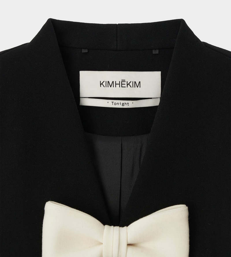 KIMHĒKIM Bicolor bow bolero jacket KIMHEKIM Bicolor Cropped Jacket - Black/White | Garmentory
