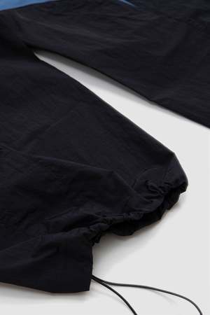 J.L - A.L Minno Trousers Shungite - Black | Garmentory