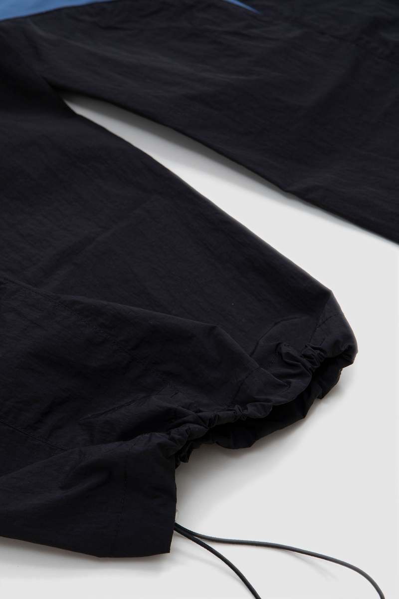 J.L - A.L Minno Trousers Shungite - Black | Garmentory