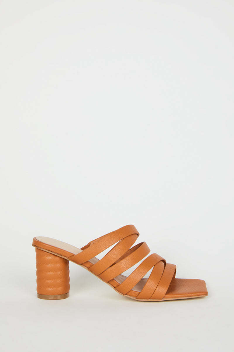 "INTENTIONALLY __________." KAMRY HEEL - CANYON