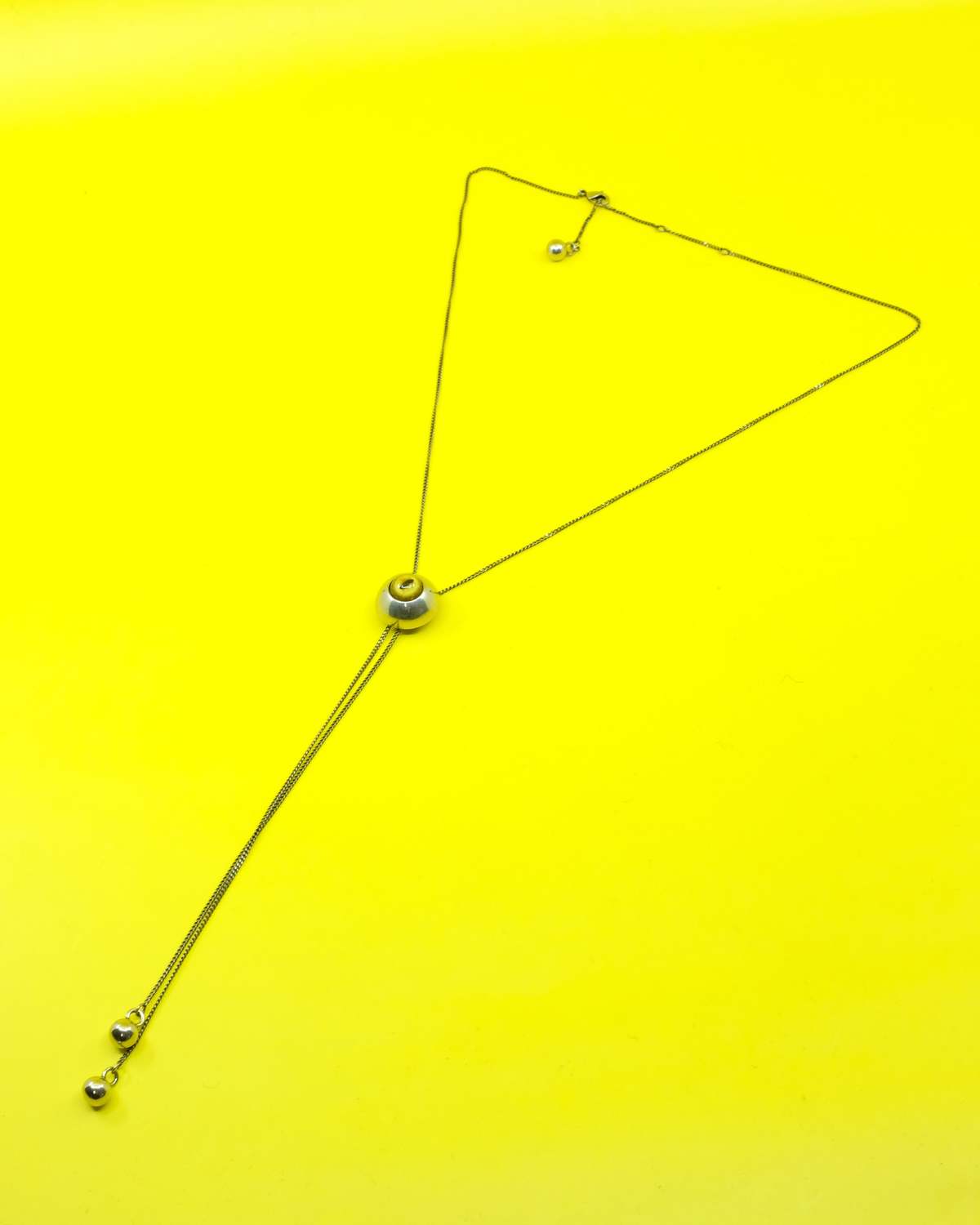 Lemaire Cat Eye Rattle Bolo Tie - Golden Yellow | Garmentory