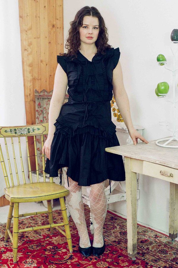 black pleated ruffle mini dress SWEETIE PLEATED RUFFLE SLEEVELESS MINI DRESS IN BLACK – AKIRA