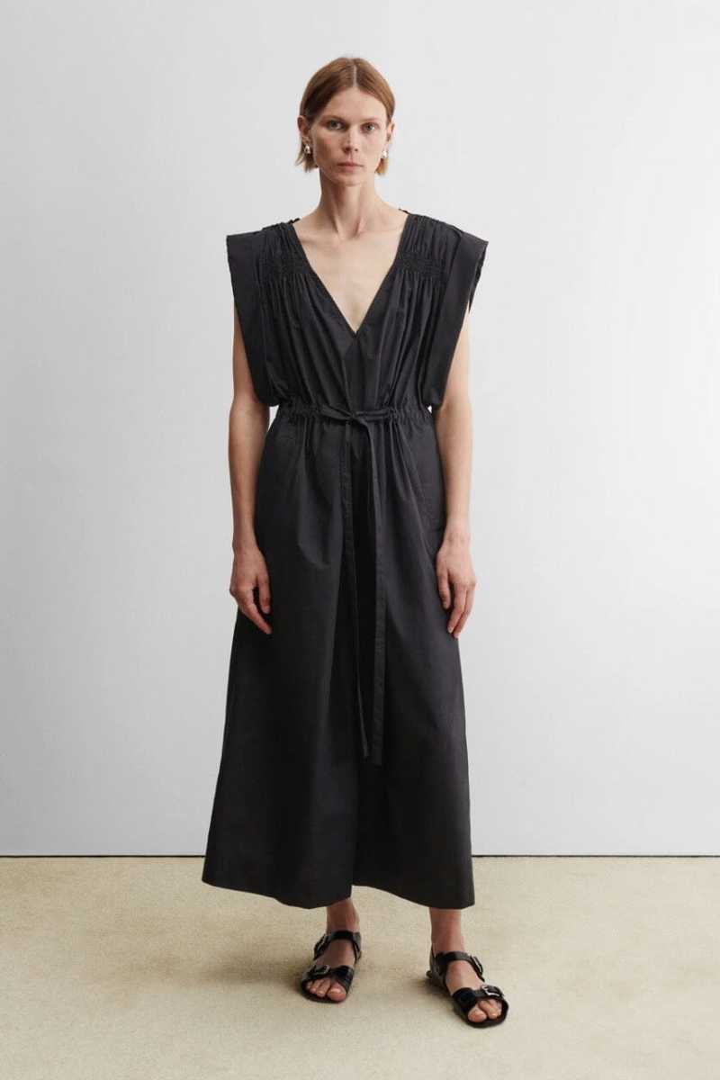 rachel comey black dress Rachel Comey // Black Knit Asymmetrical V-Neck Dress – VSP Consignment main image 0