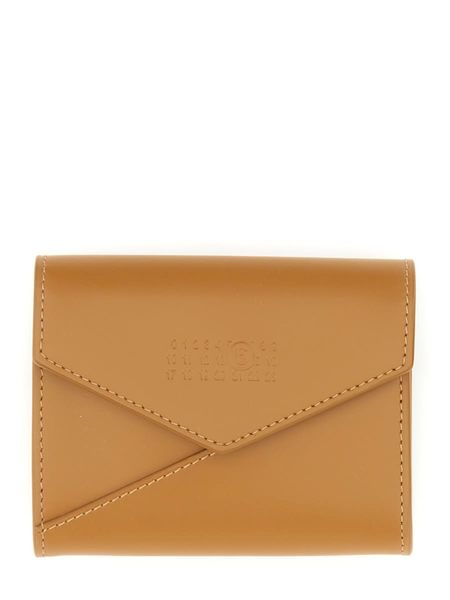 【送料&関税込】MM6 Maison Margiela Zipped Coin Purse MM6 Maison Margiela stitch-logo Coin Purse | Black | FARFETCH JO