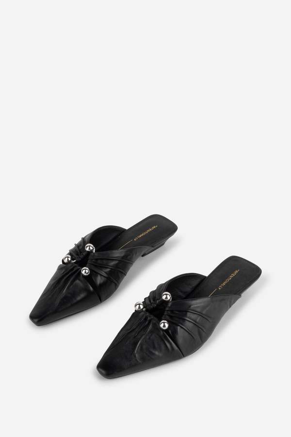 "INTENTIONALLY __________." Noah Pierced Mule "INTENTIONALLY __________." Noah Pierced Mule