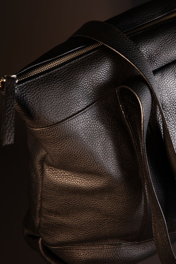 INTENTIONALLY __________. Nevada Leather Weekender Bag - Black