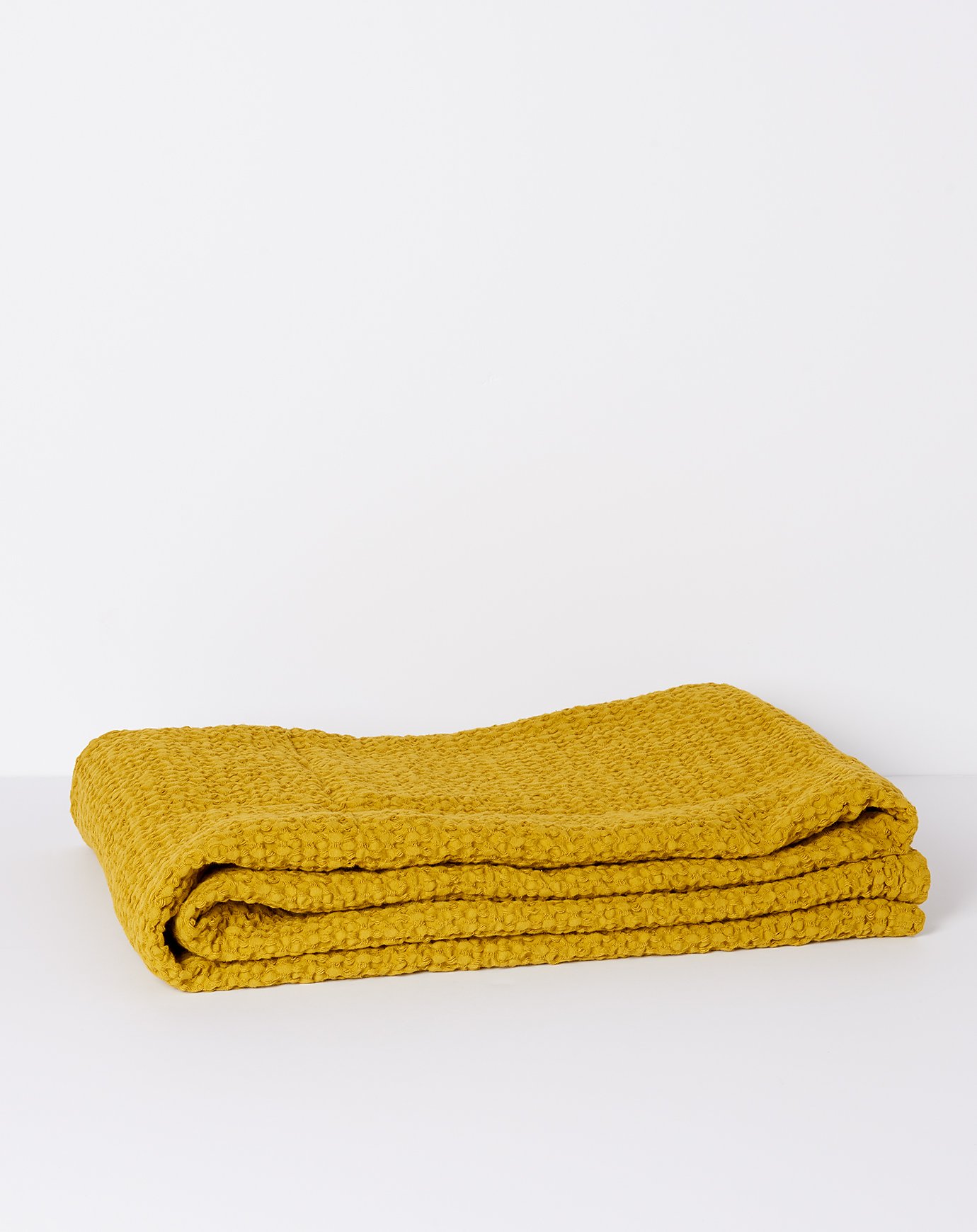 Hawkins New York Simple Waffle Bath Sheet Towel Mustard Garmentory