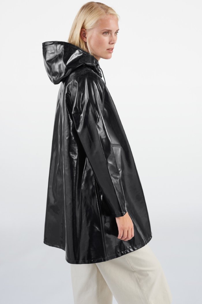 black shiny rain mac
