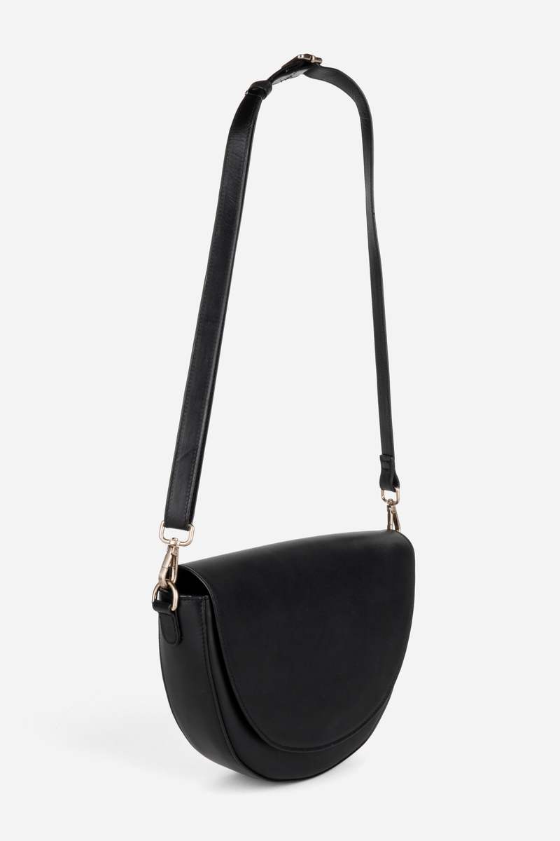 INTENTIONALLY __________. Michigan Half Moon Leather Crossbody Bag - Black