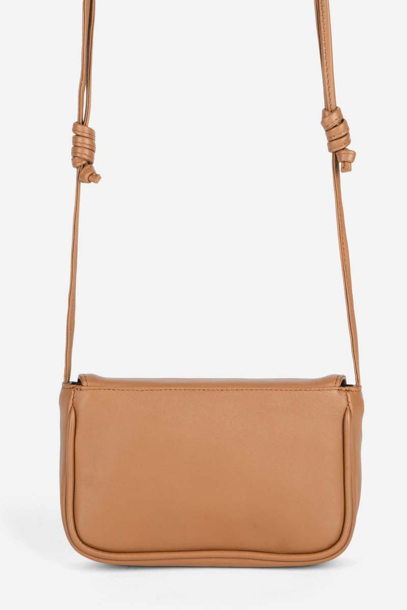 INTENTIONALLY __________. Orleans Leather Mini Crossbody Bag