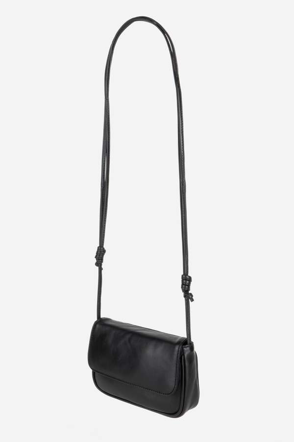 INTENTIONALLY __________. Orleans Leather Mini Crossbody Bag