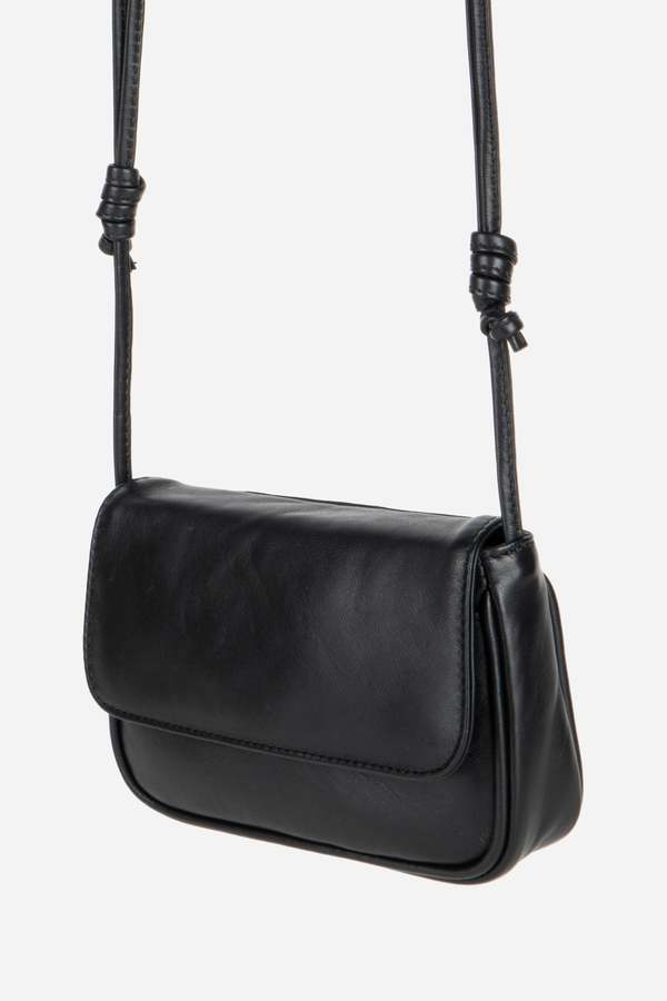 INTENTIONALLY __________. Orleans Leather Mini Crossbody Bag