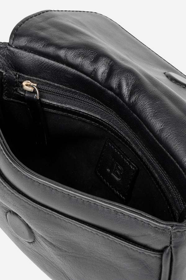 INTENTIONALLY __________. Orleans Leather Mini Crossbody Bag