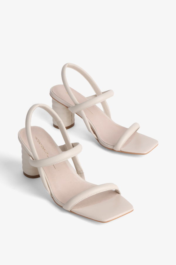 "INTENTIONALLY __________." Kifton Heel - Multi