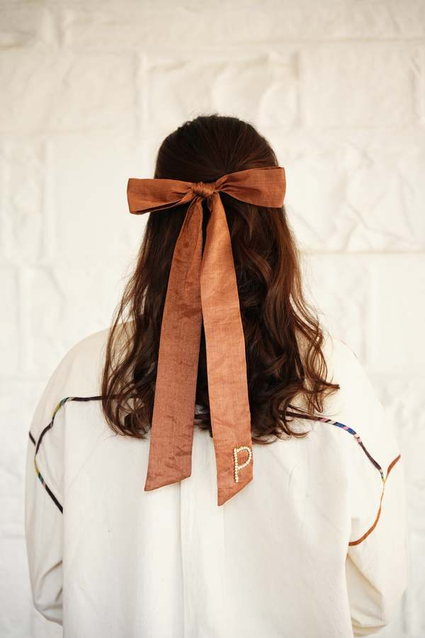 RUJUTA SHETH Gilded Bow