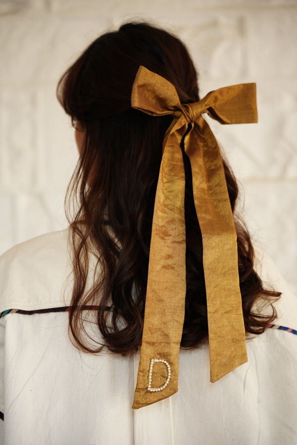 RUJUTA SHETH Gilded Bow