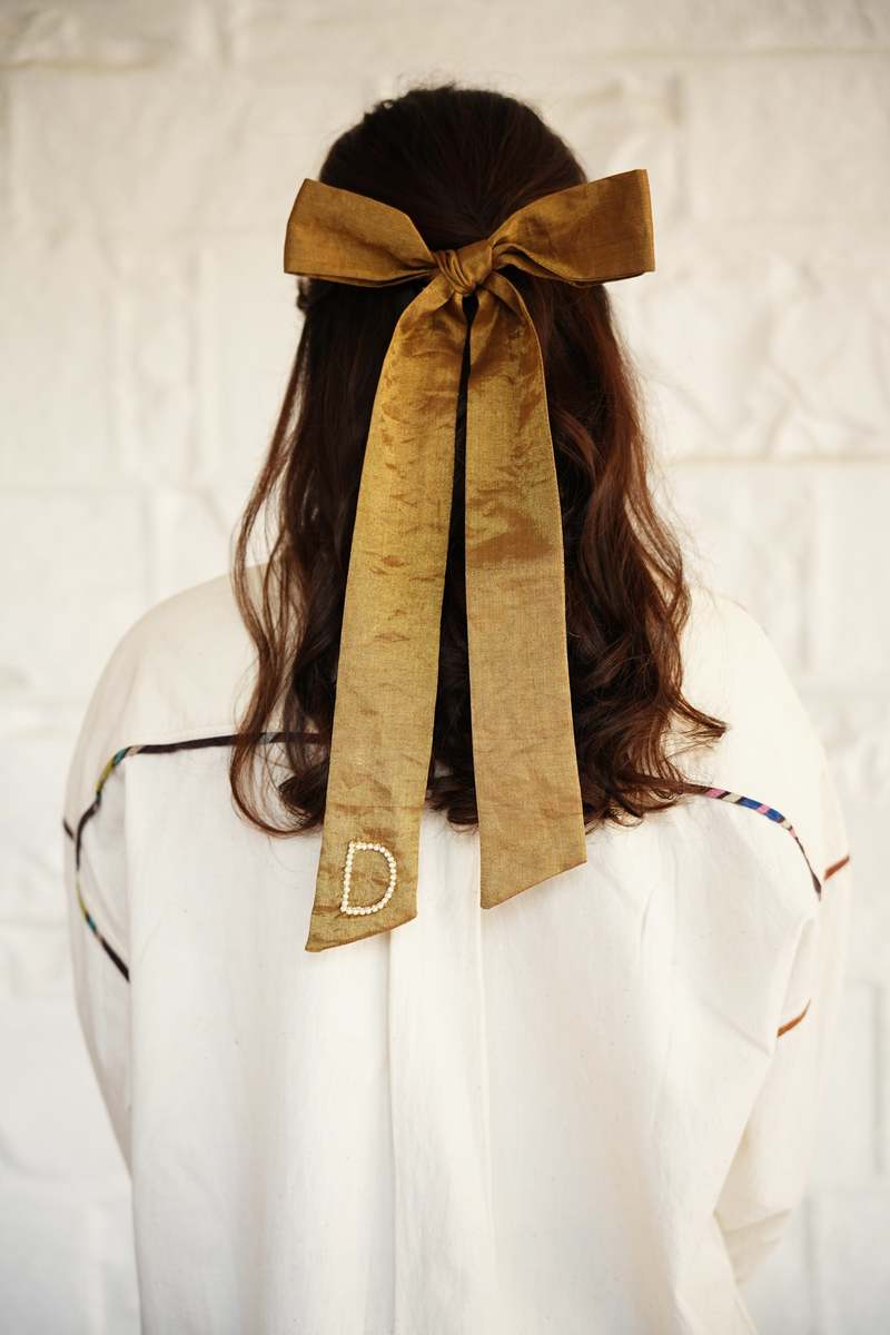 RUJUTA SHETH Gilded Bow