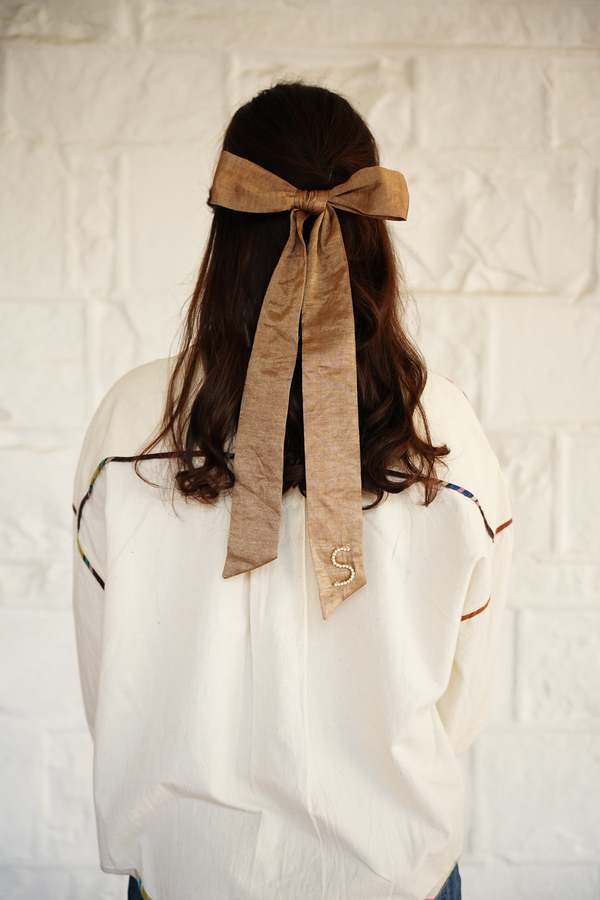 RUJUTA SHETH Gilded Bow