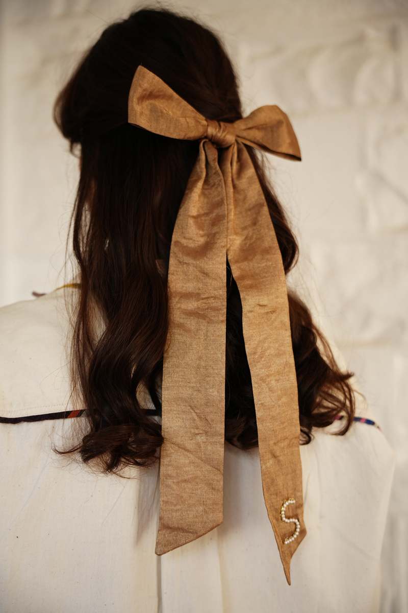 RUJUTA SHETH Gilded Bow