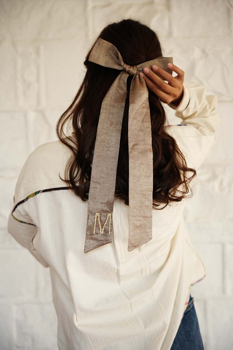 RUJUTA SHETH Gilded Bow