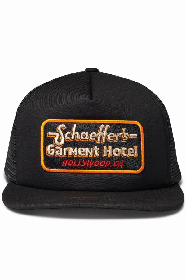 SCHAEFFER'S GARMENT HOTEL Orange Label Trucker Hat - Black