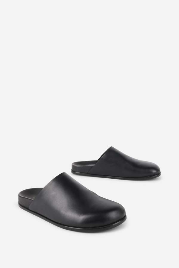 "INTENTIONALLY __________." AGATHA SLIP ON NATURAL SOLE MULE