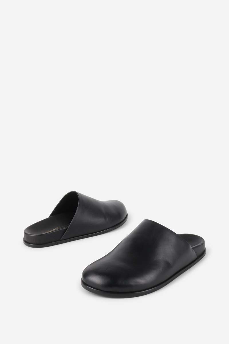 "INTENTIONALLY __________." AGATHA SLIP ON NATURAL SOLE MULE