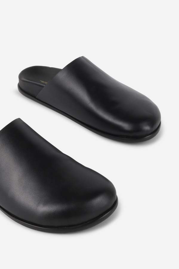 "INTENTIONALLY __________." AGATHA SLIP ON NATURAL SOLE MULE