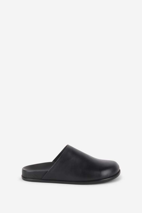 "INTENTIONALLY __________." AGATHA SLIP ON NATURAL SOLE MULE