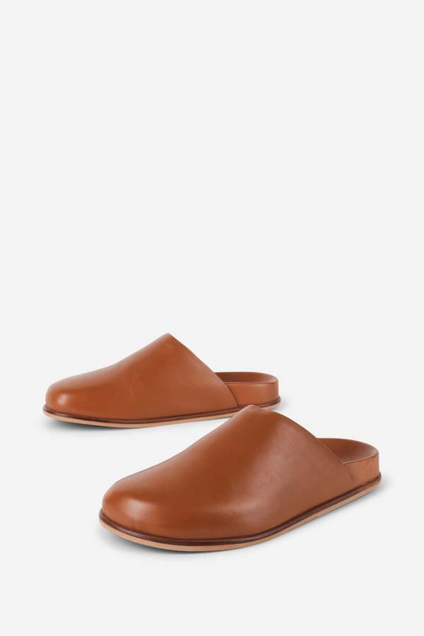 "INTENTIONALLY __________." AGATHA SLIP ON NATURAL SOLE MULE