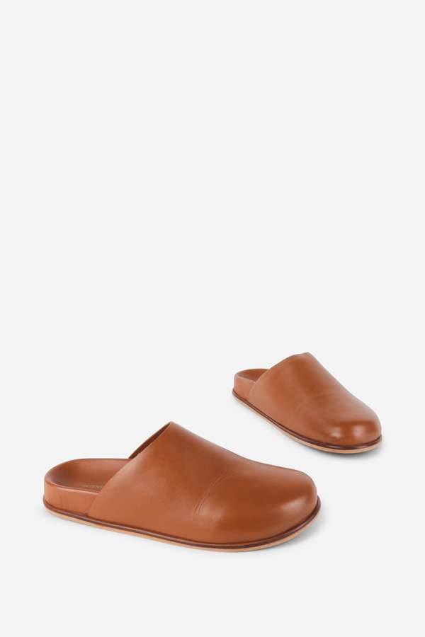 "INTENTIONALLY __________." AGATHA SLIP ON NATURAL SOLE MULE