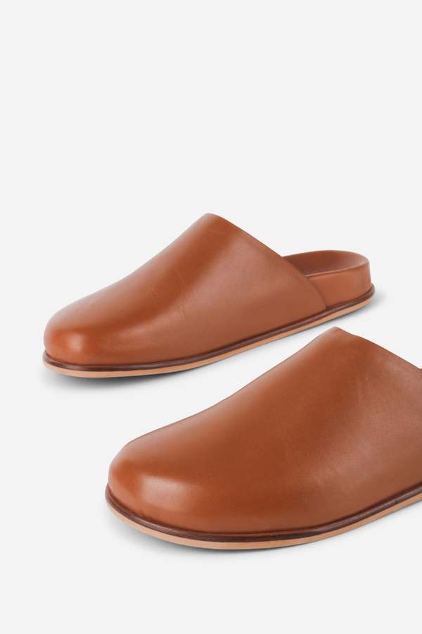 "INTENTIONALLY __________." AGATHA SLIP ON NATURAL SOLE MULE