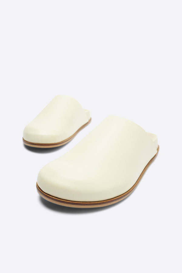 "INTENTIONALLY __________." AGATHA SLIP ON NATURAL SOLE MULE