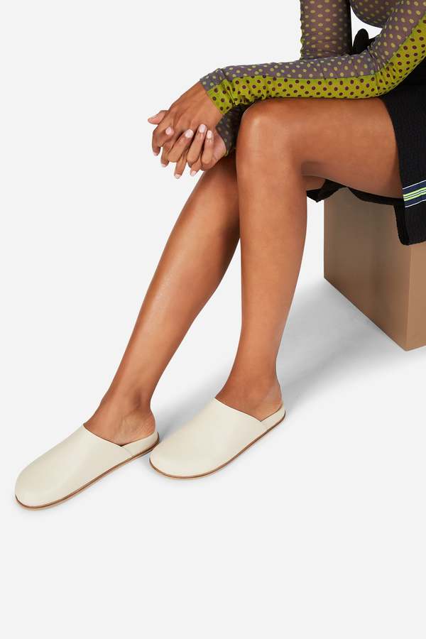 "INTENTIONALLY __________." AGATHA SLIP ON NATURAL SOLE MULE