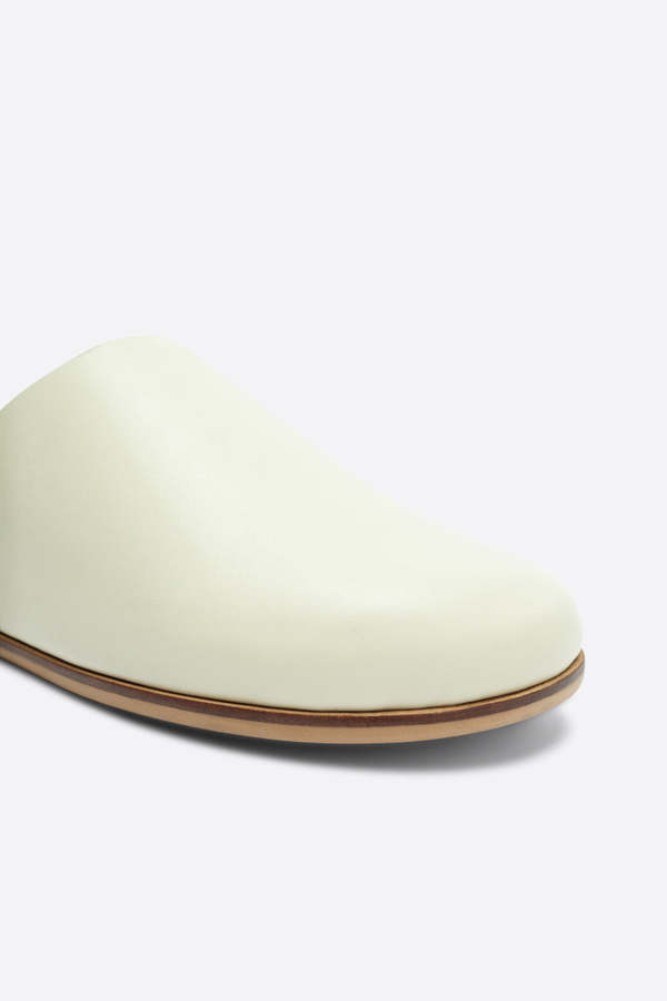 "INTENTIONALLY __________." AGATHA SLIP ON NATURAL SOLE MULE