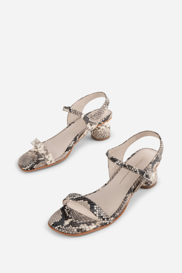 "INTENTIONALLY __________." Opinion Animal Print Heel - Black White