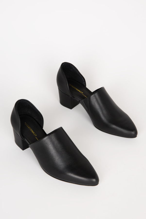 "INTENTIONALLY __________." Perf-Hi Heel - Black