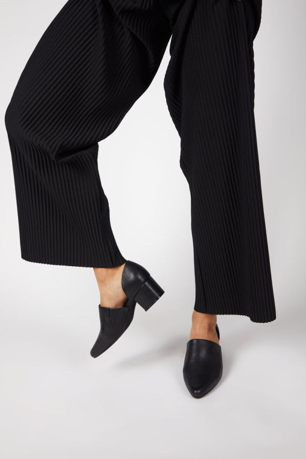 "INTENTIONALLY __________." Perf-Hi Heel - Black