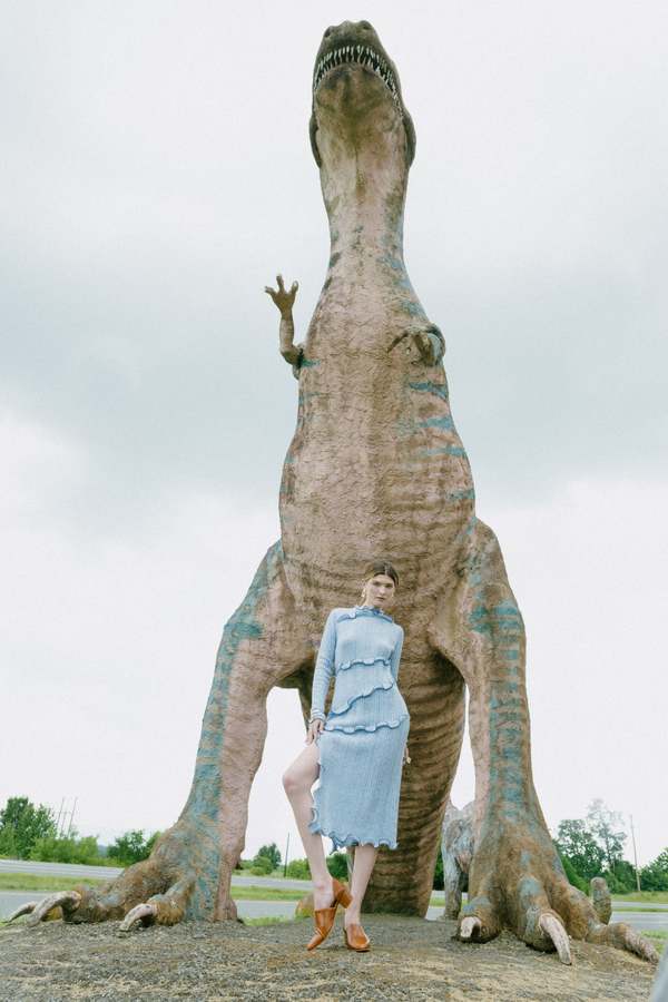 "INTENTIONALLY __________." Perf-Hi Heel - Black