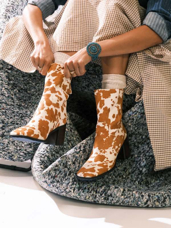 "INTENTIONALLY __________." PG BOOT - MOO/MOO BROWN/TAUPE